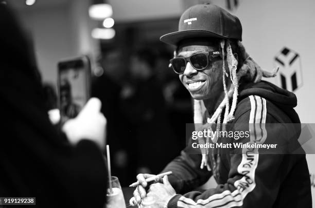 Recording artist Lil Wayne attends Neiman Marcus x Young Money Launch at Neiman Marcus Beverly Hills on February 16, 2018 in Beverly Hills,...