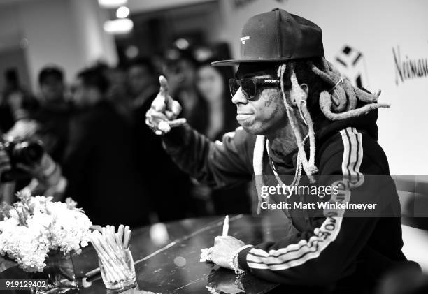 Recording artist Lil Wayne attends Neiman Marcus x Young Money Launch at Neiman Marcus Beverly Hills on February 16, 2018 in Beverly Hills,...