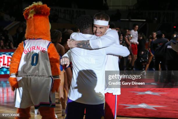 Nate Robinson and Jason Williams hug before the NBA All-Star Celebrity Game presented by Ruffles as a part of 2018 NBA All-Star Weekend at the Los...