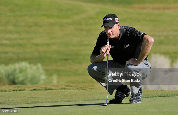 Jim Furyk checks his line for a putt during the first round of the Justin Timberlake Shriners Hospitals for Children Open held at TPC Summerlin on...