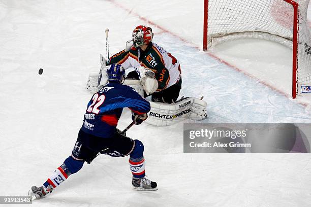 Goalkeeper Dennis Endras of Augsburg saves the final penalty of Colin Forbes of Mannheim during the DEL match between Adler Mannheim and Augsburger...