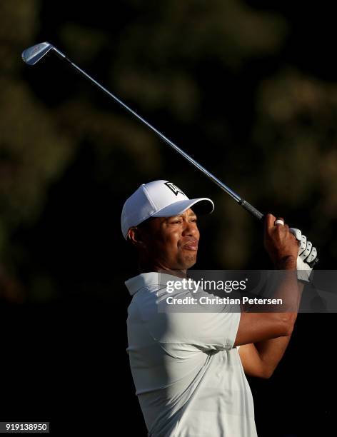 Tiger Woods plays his shot from the 16th tee during the second round of the Genesis Open at Riviera Country Club on February 16, 2018 in Pacific...