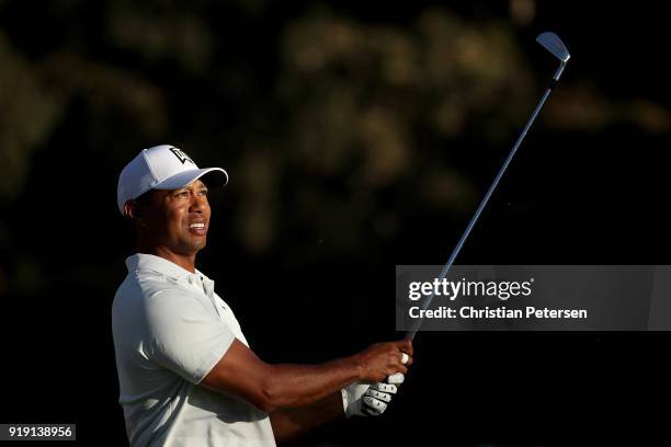 Tiger Woods plays his shot from the 16th tee during the second round of the Genesis Open at Riviera Country Club on February 16, 2018 in Pacific...