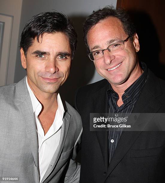 John Stamos and Bob Saget pose backstage at "Bye Bye Birdie" on Broadway at the Henry Miller's Theatre on October 14, 2009 in New York City.