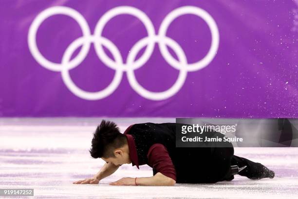 Han Yan of China falls while competing during the Men's Single Free Program on day eight of the PyeongChang 2018 Winter Olympic Games at Gangneung...