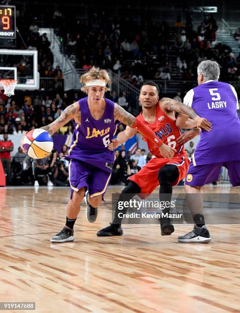 Recording artist Justin Bieber, Olympic sprinter Andre De Grasse and Marc Lasry play during the NBA All-Star Celebrity Game 2018 presented by Ruffles...