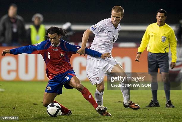 Michael Bradley of the US vies for the ball with Michael Barrantes of Costa Rica during US v Costa Rica World Cup Qualifing match in Washington, DC,...