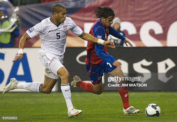 Bryan Ruizof Costa Rica vies for the ball with Oguchi Onyewu of the US during US v Costa Rica World Cup Qualifing match in Washington, DC, October...