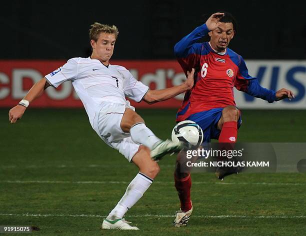 Midfielder Stuart Holden vies with Michael Barrantes of Costa Rica during a 2010 World Cup qualifier at RFK Stadium in Washington on October 14,...