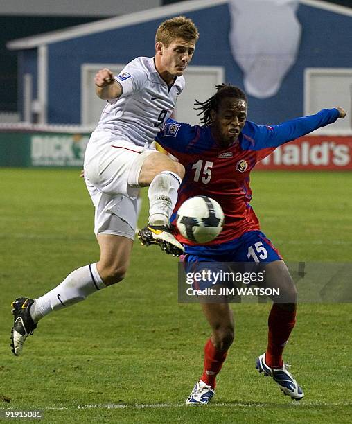 Junior Diaz of Costa Rica vies for the ball with Robbie Rogers of the US during US v Costa Rica World Cup Qualifing match in Washington, DC, October...