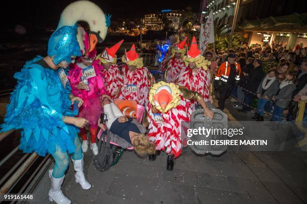 Men take part in the XXIV edition of the high heels marathon called "Mascarita Ponte Tacon" during carnival in Puerto de La Cruz, on the Canary...