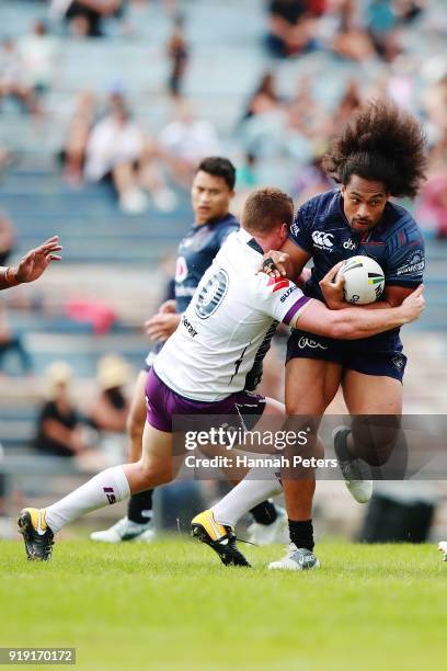 Bunty Afoa of the Warriors charges forward during the NRL trial match between the New Zealand Warriors and the Melbourne Storm at Rotorua...