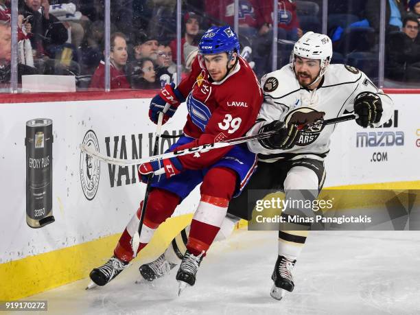 Jordan Boucher of the Laval Rocket and Connor Hobbs of the Hershey Bears skate after the puck during the AHL game at Place Bell on February 16, 2018...