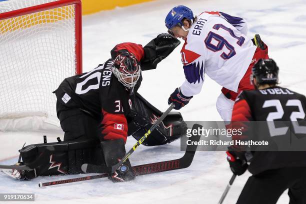 Martin Erat of the Czech Republic attempts a shot on Ben Scrivens of Canada during the Men's Ice Hockey Preliminary Round Group A game on day eight...