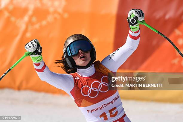 Austria's Anna Fenninger Veith celebrates after crossing the finish line of the Women's Super-G at the Jeongseon Alpine Center during the Pyeongchang...