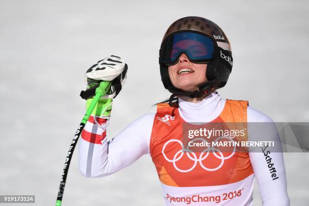 Austria's Anna Fenninger Veith celebrates after crossing the finish line of the Women's Super-G at the Jeongseon Alpine Center during the Pyeongchang...