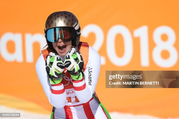 Austria's Anna Fenninger Veith celebrates after crossing the finish line of the Women's Super-G at the Jeongseon Alpine Center during the Pyeongchang...