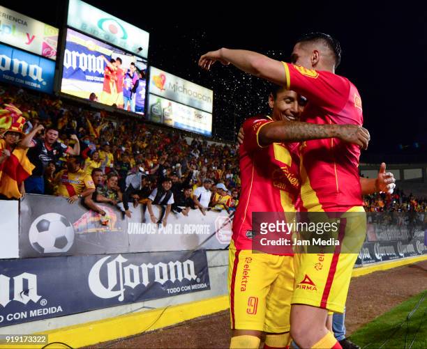 Raul Ruidiaz of Morelia celebrates with teammate Diego Valdez after scoring the second goal of his team during the 8th round match between Monarcas...