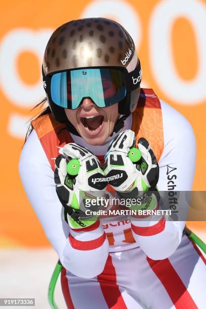 Austria's Anna Fenninger Veith celebrates after crossing the finish line of the Women's Super-G at the Jeongseon Alpine Center during the Pyeongchang...