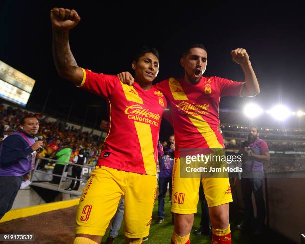 Raul Ruidiaz of Morelia celebrates with teammate Diego Valdez after scoring the second goal of his team during the 8th round match between Monarcas...