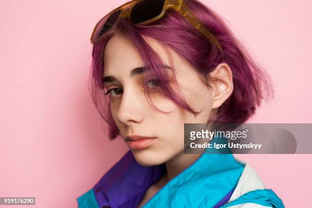 portrait of fashionable young professional - purple hair fotografías e imágenes de stock