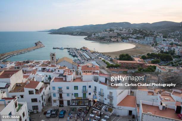 wide angle view of the coast of peniscola, costa del azahar, spain - costa_del_azahar stock pictures, royalty-free photos & images