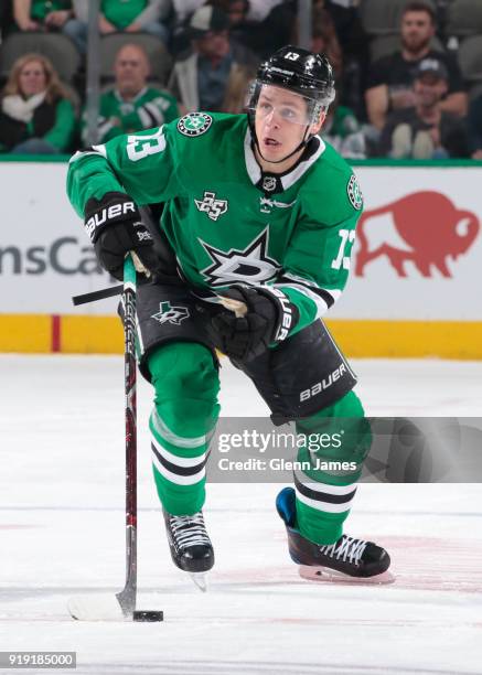 Mattias Janmark of the Dallas Stars handles the puck against the St. Louis Blues at the American Airlines Center on February 16, 2018 in Dallas,...