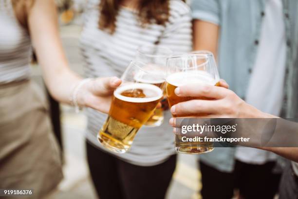 happy hour in london - lager stock pictures, royalty-free photos & images