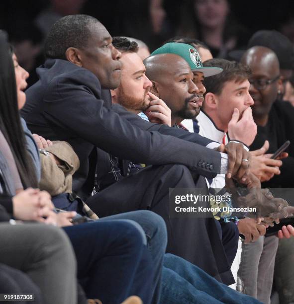 Dikembe Mutombo and Floyd Mayweather attend the 2018 Mountain Dew Kickstart Rising Stars Game at Staples Center on February 16, 2018 in Los Angeles,...