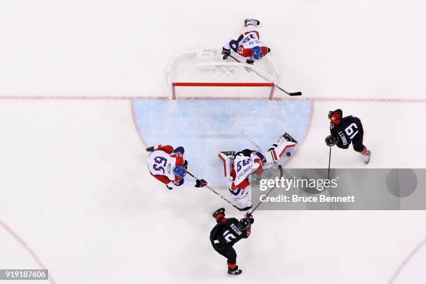 Brandon Kozun of Canada makes a shot against Pavel Francouz of the Czech Republic during the Men's Ice Hockey Preliminary Round Group A game on day...