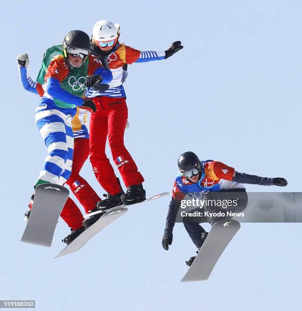 Michela Moioli of Italy races down the slope on her way to winning the gold medal in the women's snowboard cross at the Pyeongchang Winter Olympics...