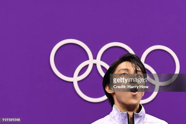 Yuzuru Hanyu of Japan reacts after competing during the Men's Single Free Program on day eight of the PyeongChang 2018 Winter Olympic Games at...