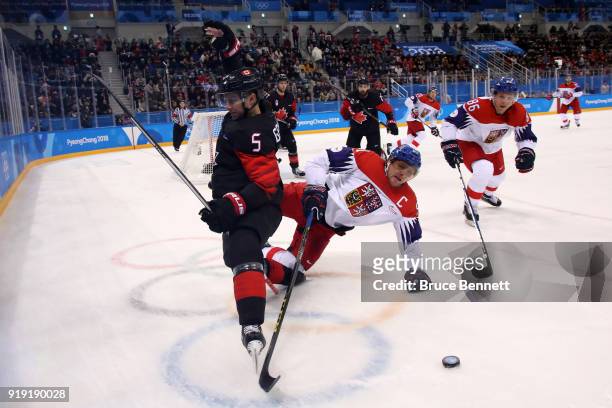 Chay Genoway of Canada collides with Martin Erat of the Czech Republic in the third period during the Men's Ice Hockey Preliminary Round Group A game...