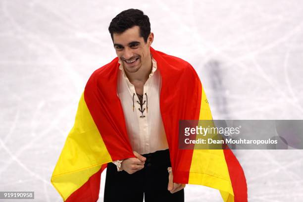 Bronze medal winner Javier Fernandez of Spain celebrates during the victory ceremony for the Men's Single Free Program on day eight of the...