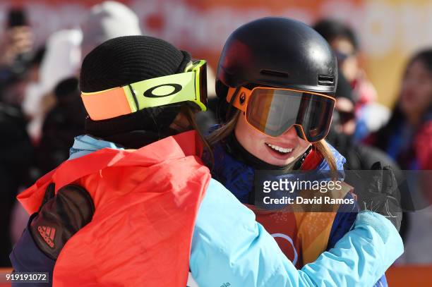 Winner of the gold, Sarah Hoefflin of Switzerland celebrates with bronze medalist Isabel Atkin of Great Britain during the Freestyle Skiing Ladies'...