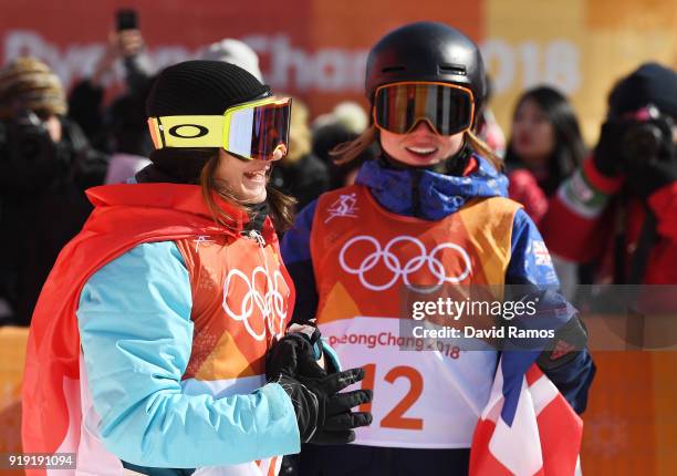 Winner of the gold, Sarah Hoefflin of Switzerland celebrates with bronze medalist Isabel Atkin of Great Britain during the Freestyle Skiing Ladies'...