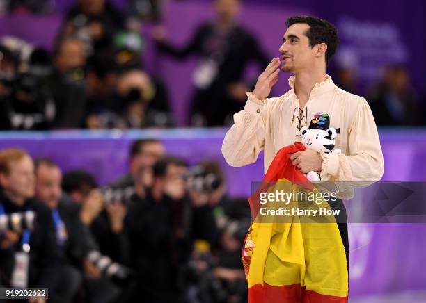 Bronze medal winner Javier Fernandez of Spain celebrates during the victory ceremony for the Men's Single Free Program on day eight of the...