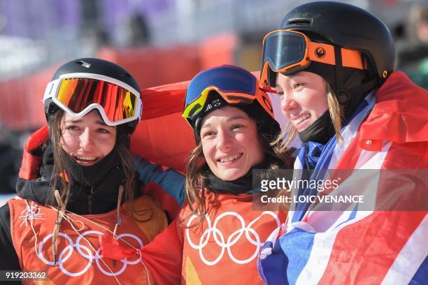 Switzerland's Mathilde Gremaud, Switzerland's Sarah Hoefflin and Great Britain's Isabel Atkin celebrate after the victory ceremony after the women's...