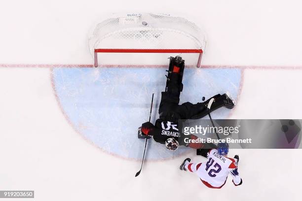 Petr Koukal of the Czech Republic makes a shot on Ben Scrivens of Canada in an overtime shootout during the Men's Ice Hockey Preliminary Round Group...