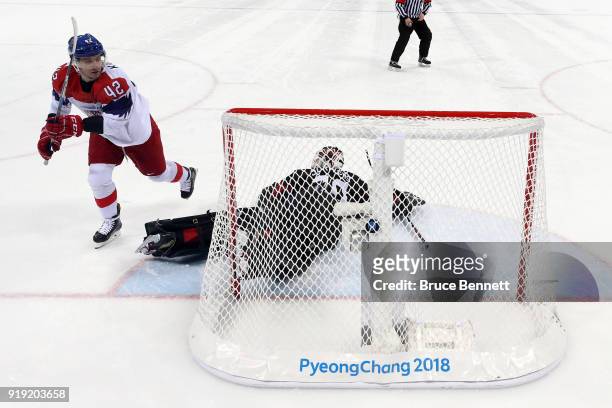 Petr Koukal of the Czech Republic makes a shot on Ben Scrivens of Canada in an overtime shootout during the Men's Ice Hockey Preliminary Round Group...