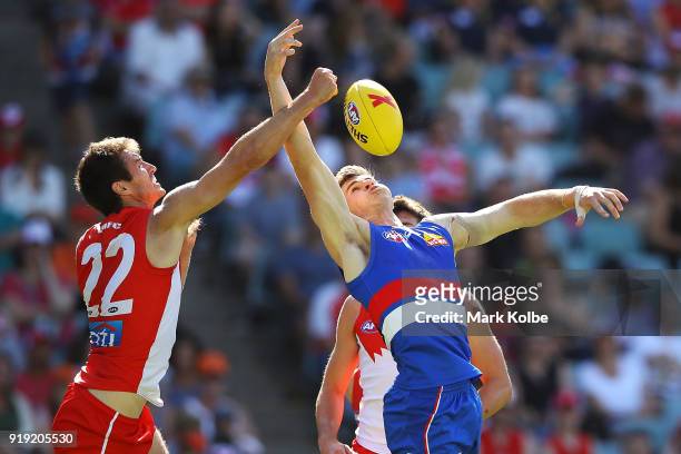 Dean Towers of the Swans and Billy Gowers of the Bulldogs compete for the ball during the AFLX match between the Sydney Swans and the Western...