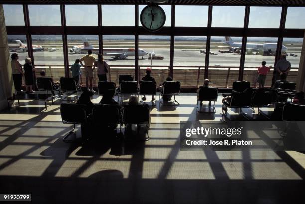 Passengers in the waiting room of the Barajas airport