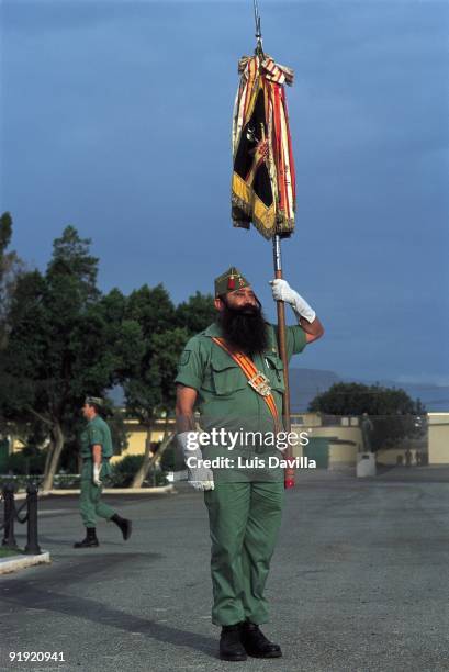 Welded of the Legion carrying its standard. Base ´Álvarez of Sotomayor´ on Viator, Almeria.