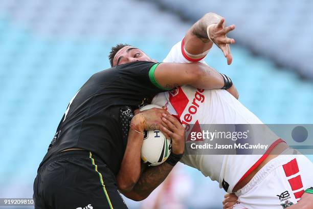 Paul Vaughan of the Dragons is tackled during the NRL trial match between the St George Illawarra Dragons and Hull at ANZ Stadium on February 17,...