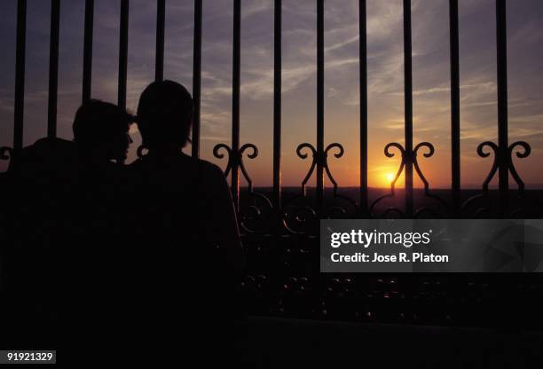 Sunset from the Royal Palace A couple observes the sunset from the Royal Palace