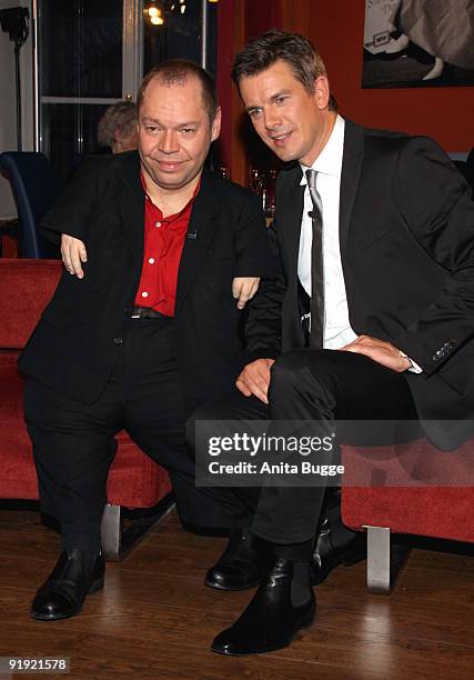 Singer Thomas Quasthoff and host Markus Lanz attend the taping of the birthday show for Bassbaritone singer Thomas Quasthoff on October 15, 2009 in...