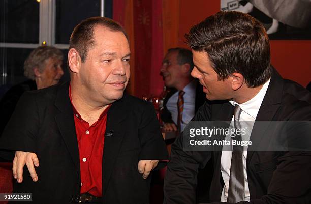 Singer Thomas Quasthoff and host Markus Lanz attend the taping of the birthday show for Bassbaritone singer Thomas Quasthoff on October 15, 2009 in...