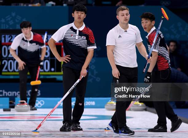 Kyle Waddell of Great Britain reacts to his shot as KiBok Lee and SeHyeon Seong of South Korea line up their shot in a 11-5 loss to South Korea...