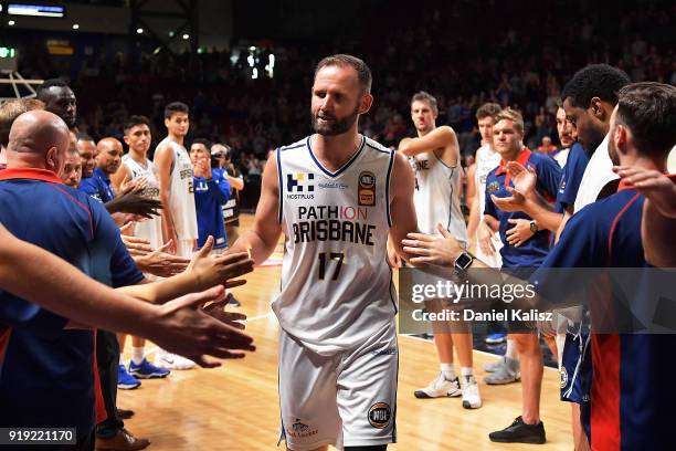 Anthony Petrie of the Brisbane Bullets receives a guard of honour after competeing in his 250th game during the round 19 NBL match between the...