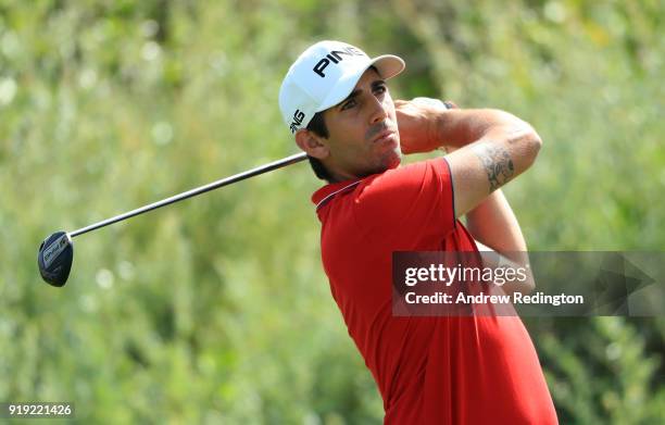 Matthieu Pavon of France tees off on the par four second hole during the third round of the NBO Oman Open at Al Mouj Golf on February 17, 2018 in...